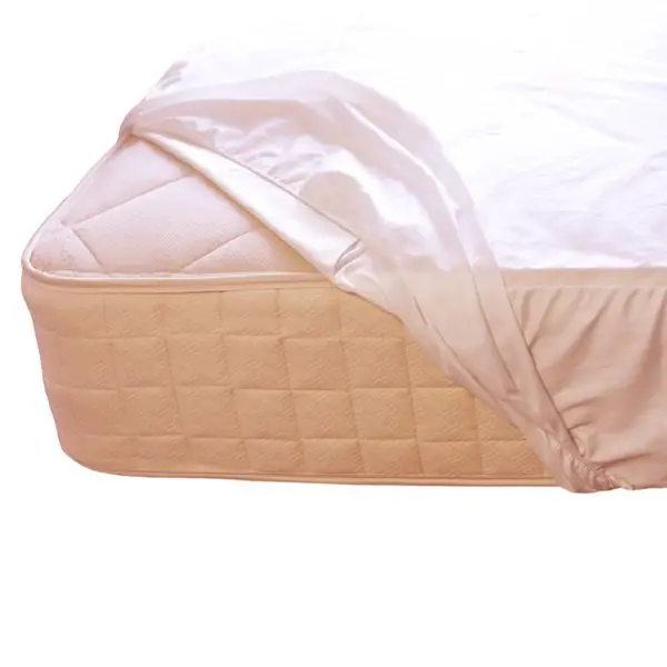 mattress with waterproof crib matress pad on it