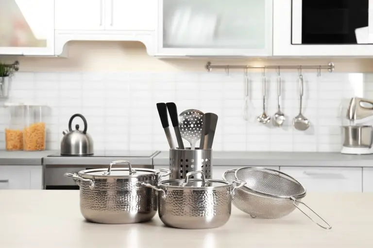 cookware for glass top stove sits on a kitchen counter