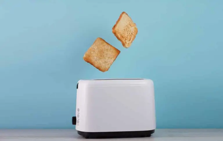 lonng slot toaster with 2 peices of toaste ejecting out