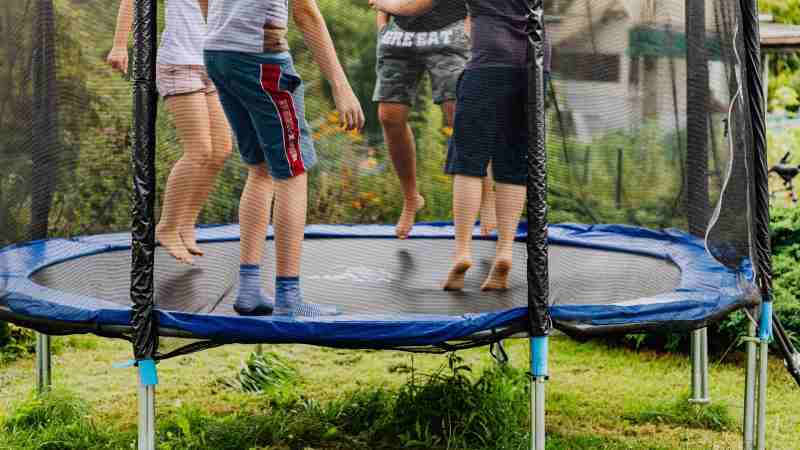 Round trampoline with kids jumping