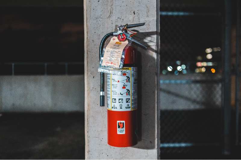 Fire extinguisher on the wall in the event of a space heater fire