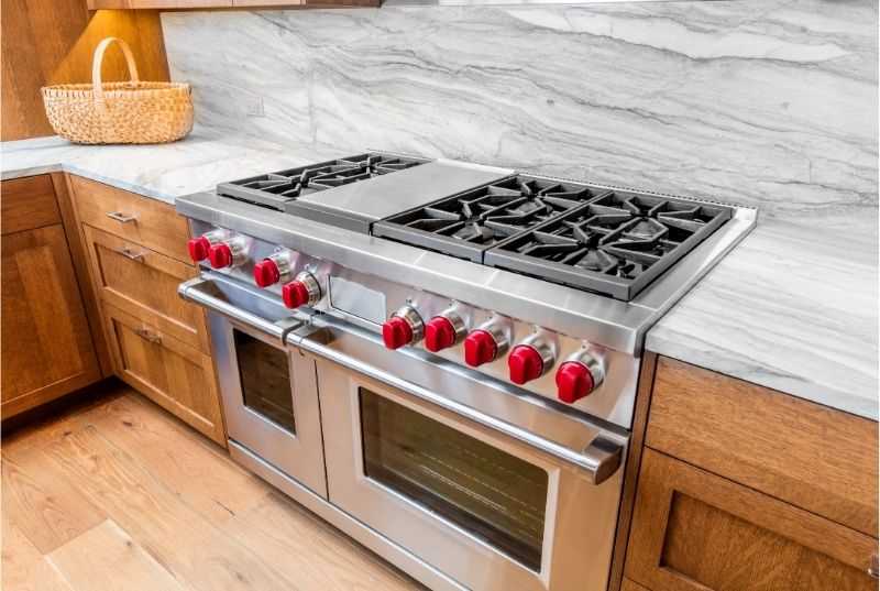 A professional gas range fitted in a home kitchen 