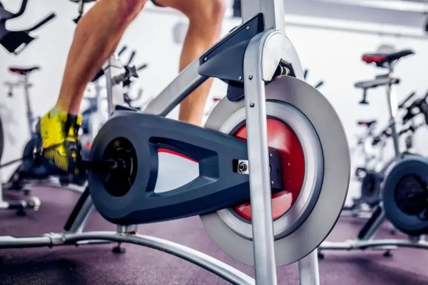 A close-up of a magnetic spin bike's front side 