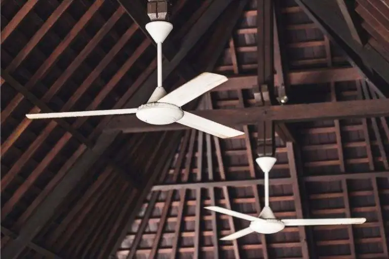 A couple of modern 3-bladed airflow ceiling fans