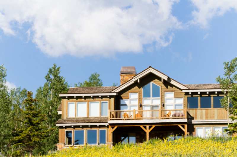 Modern mountain home under a clear sky