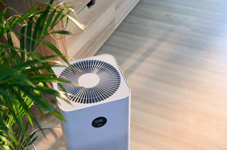 Air purifier on a wooden floor 